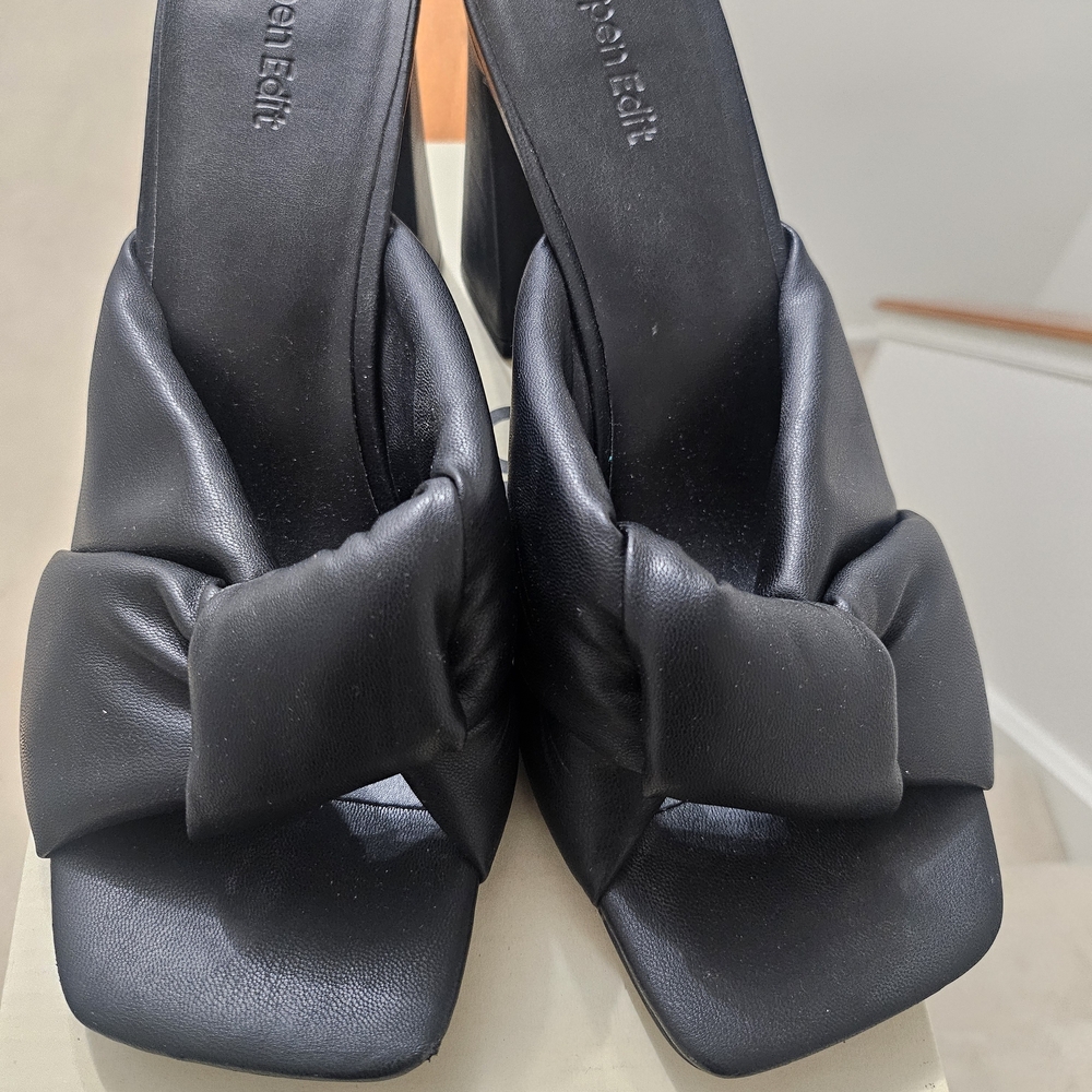 Elegant Black Leather Mules with Bow Accent